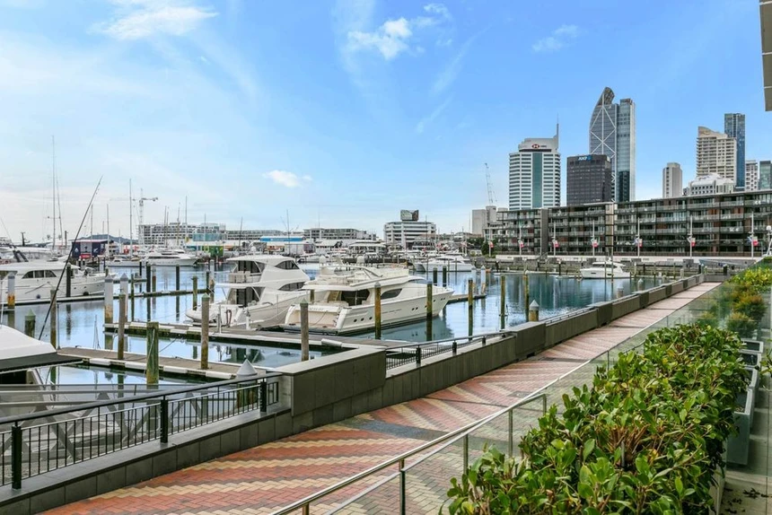 Auckland Wynyard Quarter marina with luxury yachts and the city skyline